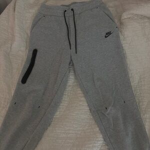 Gray Nike tech sweatpants